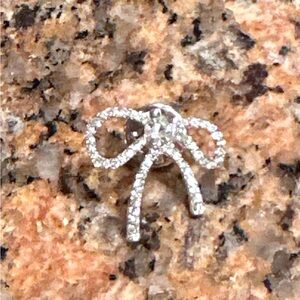 Crystal bow pins (2) One set of two pins. Dust bag included